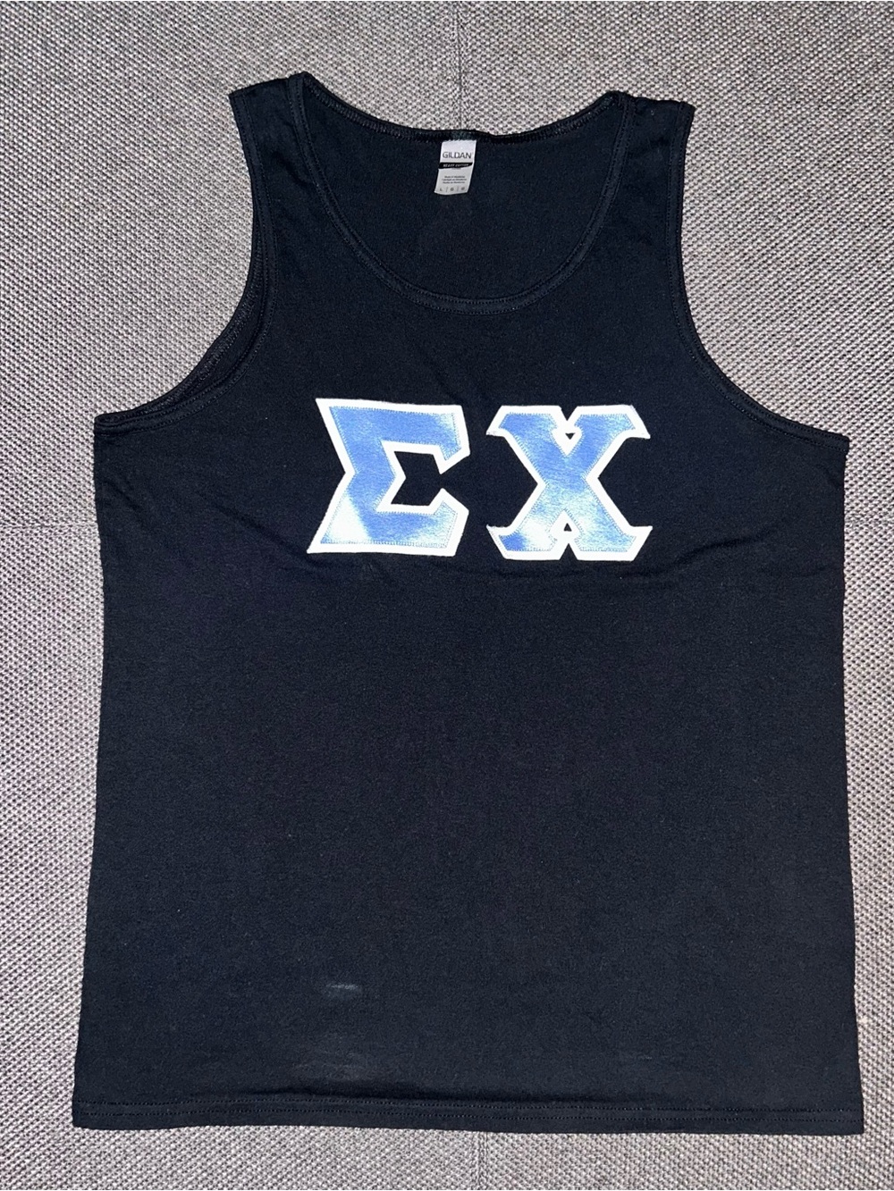 Sigma Chi black cotton tank top with blue and white Greek letters, size Large